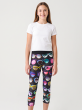 Load image into Gallery viewer, Model wearing Terez Sunglasses Capri Leggings
